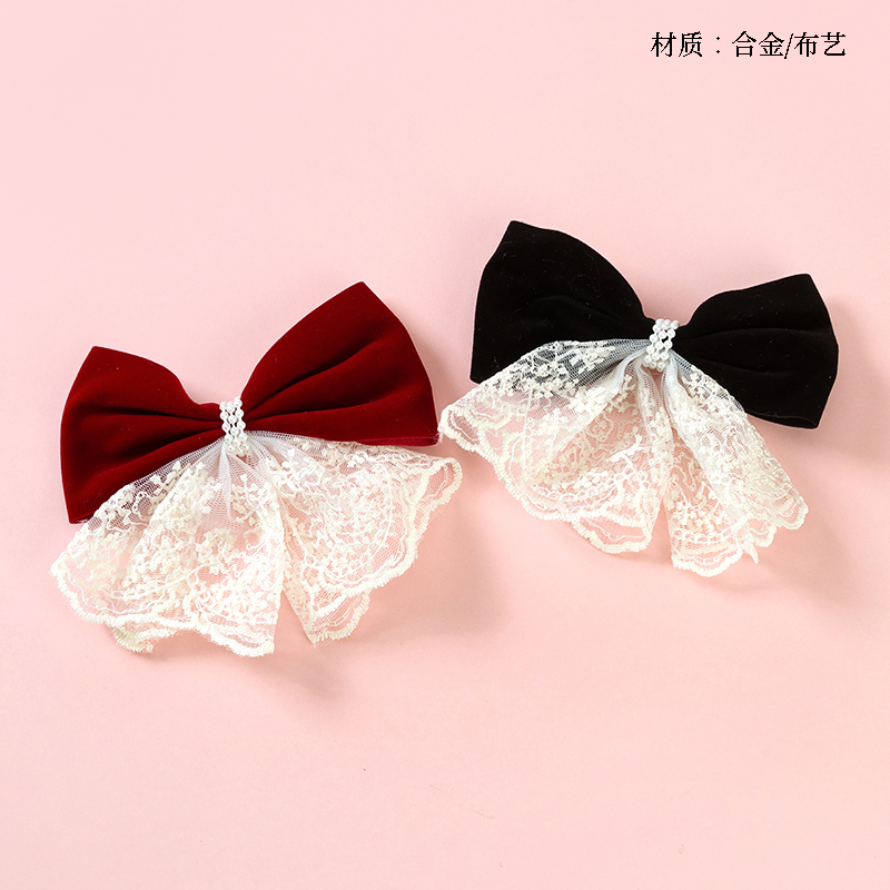 Boxed double lace bow tie duck clip