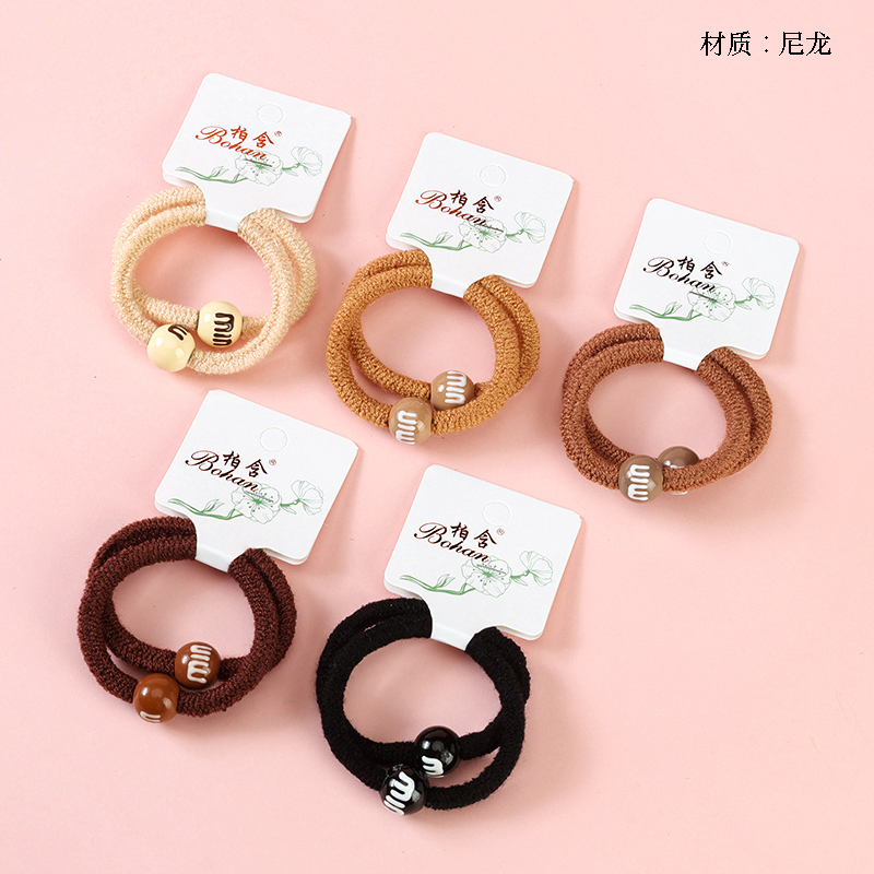 Boxed two curry color big round bead accessories rubber band