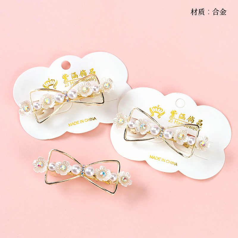 New love bow tie horizontal clip