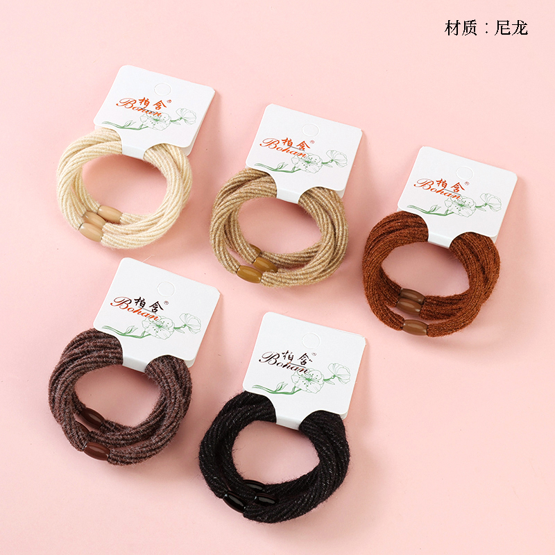Boxed three milk tea color thick high stretch rubber bands