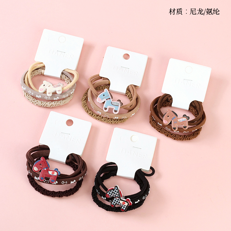 Three milk brown pony accessories rubber bands