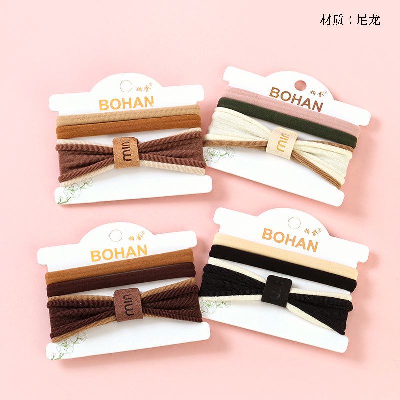 Boxed three cream-colored seamless rubber bands