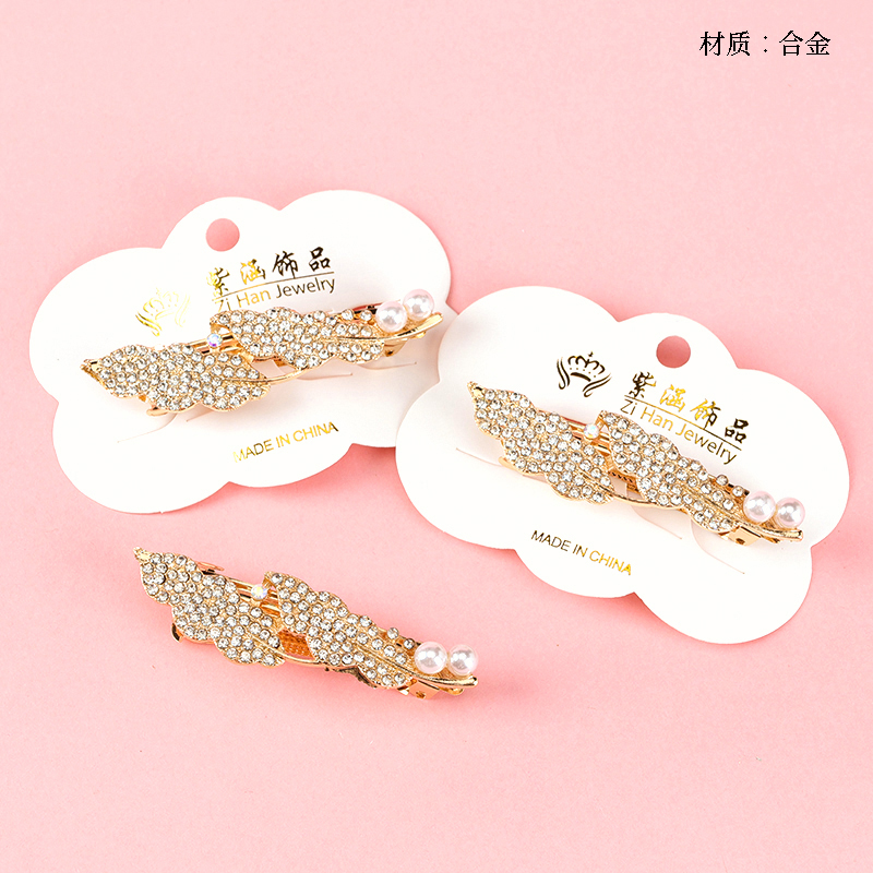 Full diamond pearl leaves horizontal clip