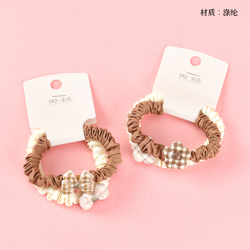 Two bowtie accessories small intestine ring