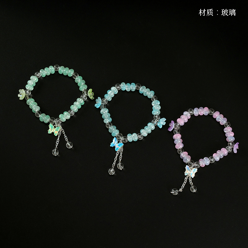 Vòng tay hạt bàn tính hoa đào bướm