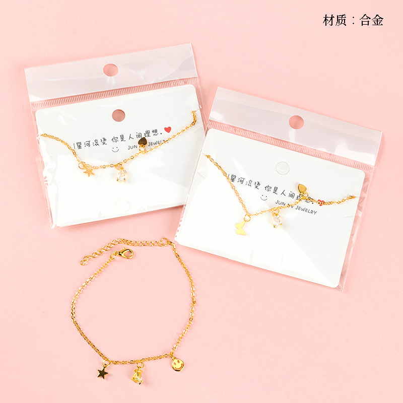 Three point diamond pendant gold bracelet