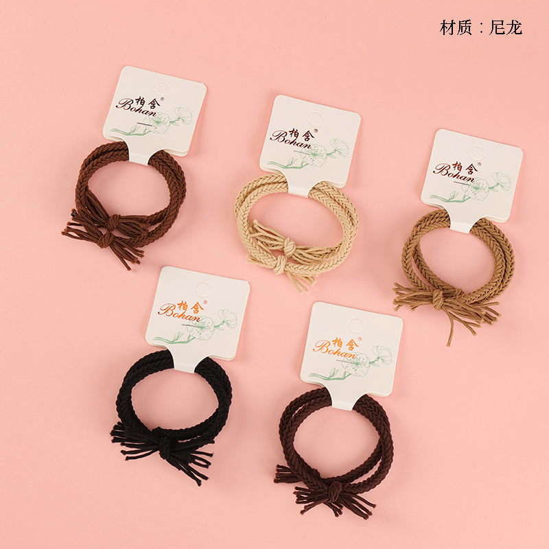 Boxed two braids knotted rubber band