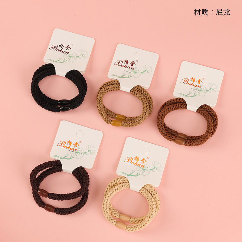 Boxed two braid curry color rubber bands