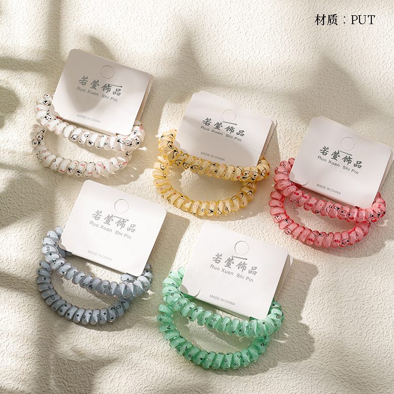 Two cartoon printed telephone lines