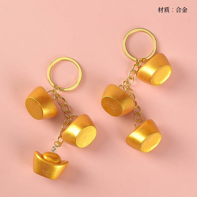 Three gold ingot pendant