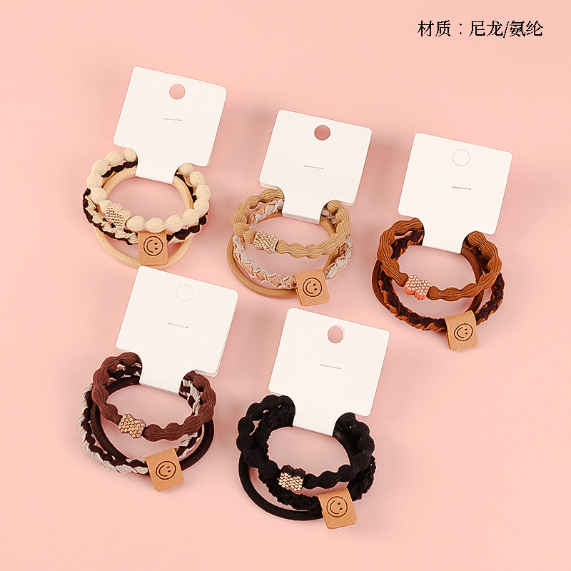 Three Twisted Braids Labeling Rubber Tendons