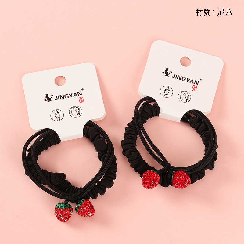 Boxed two strawberry diamond black rubber bands