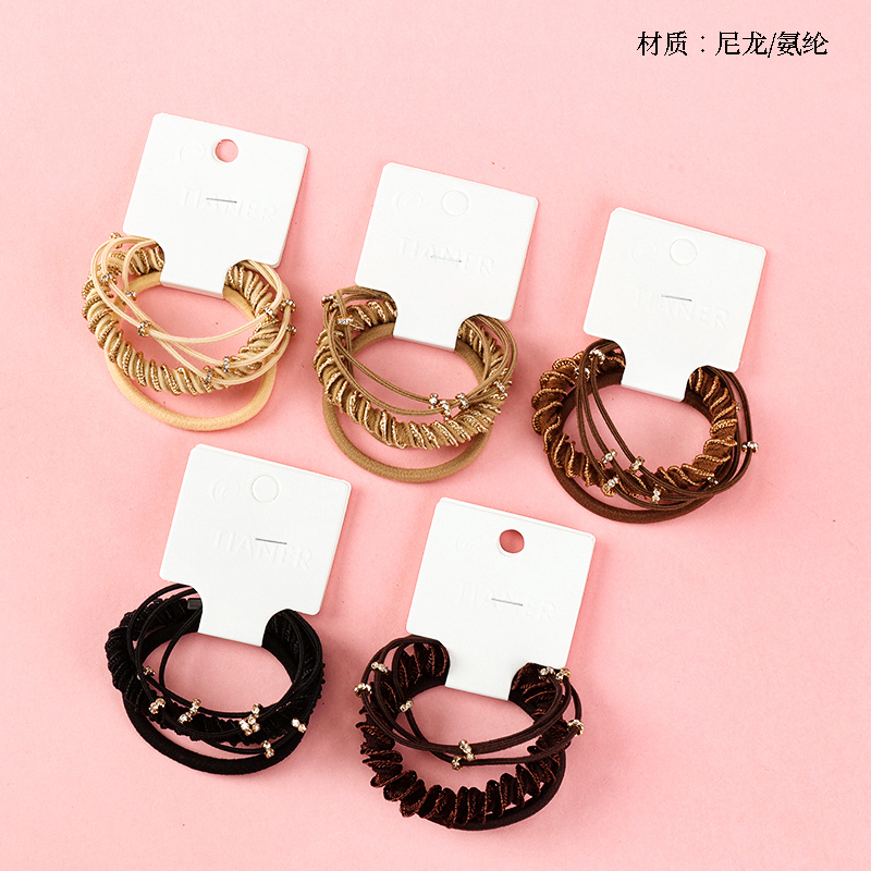 Three curry color drill ring accessories rubber band