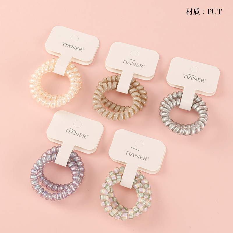 Boxed two silver gray telephone lines