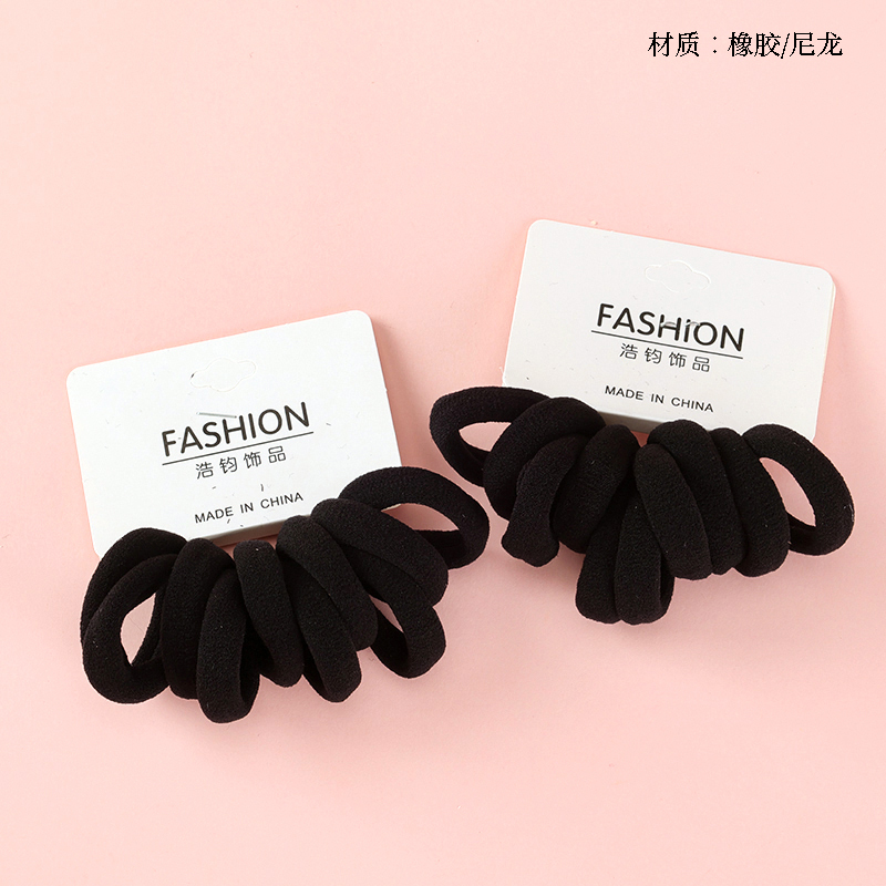 Ten black elevator rubber bands