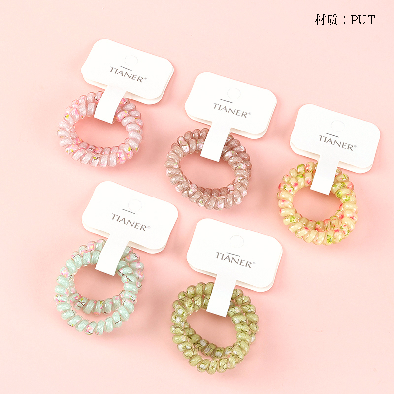 Boxed two small colored floral telephone wires