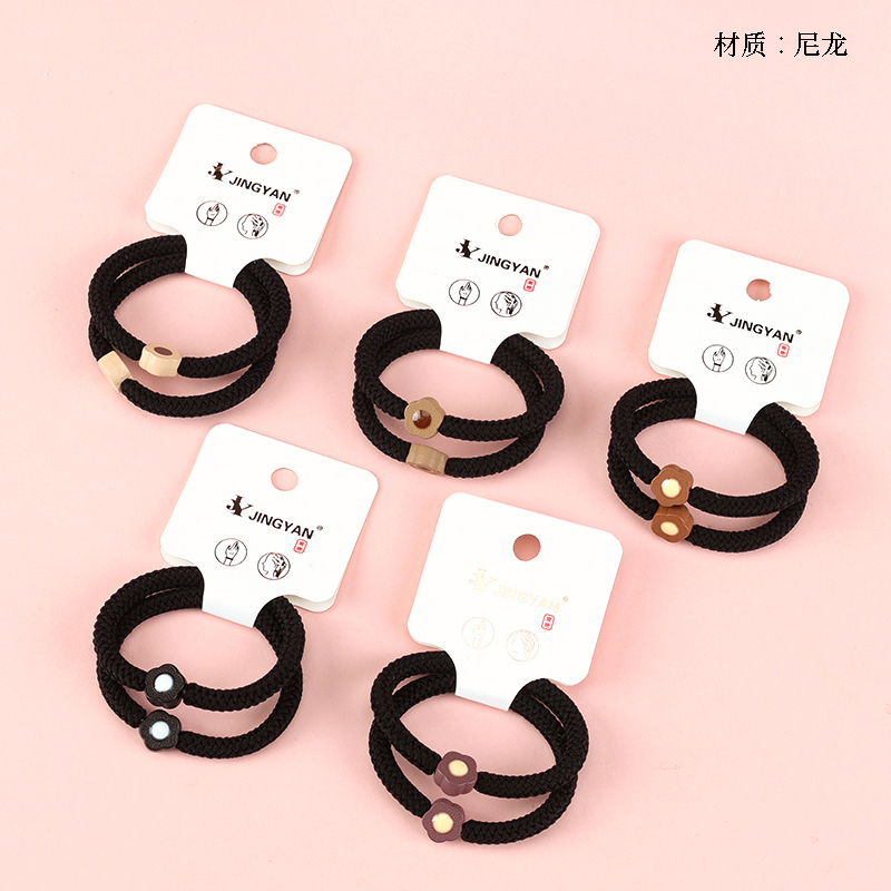 Boxed two flower accessories black rubber band