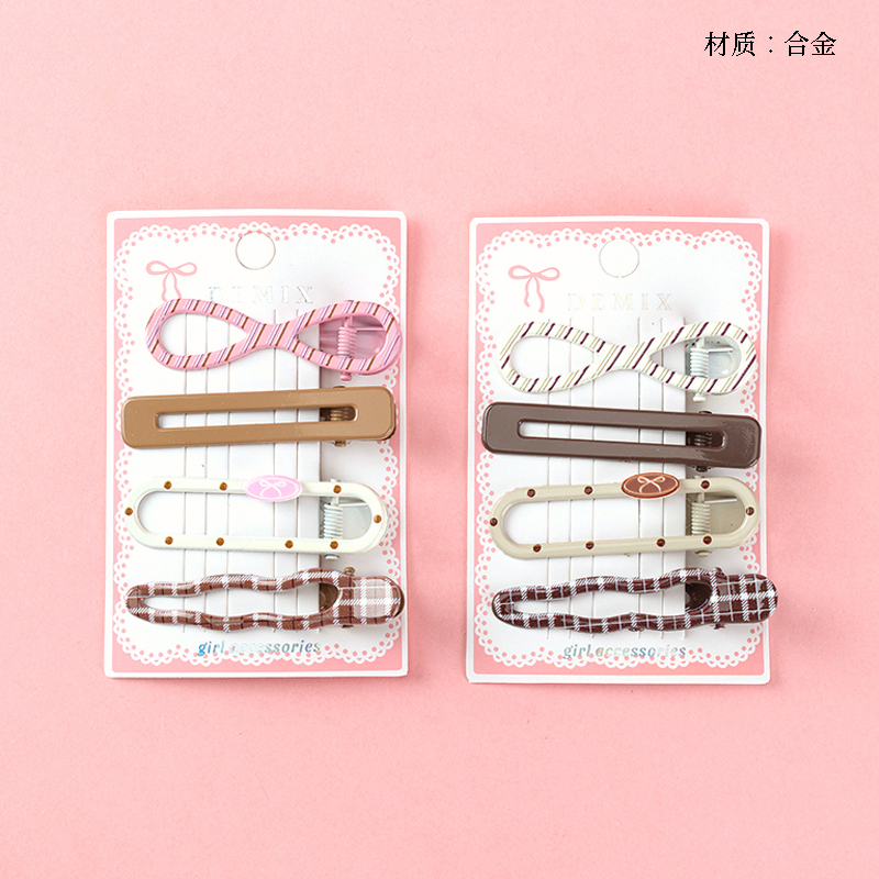 Boxed Four Hollow Striped Duck Clip