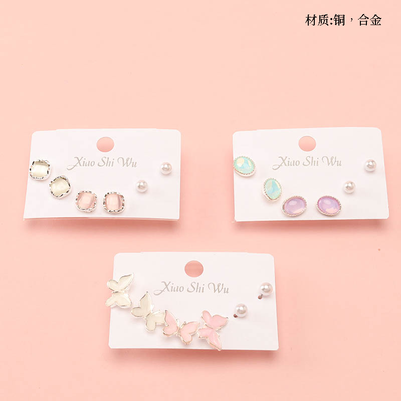 Three pairs of mixed pearl stud earrings