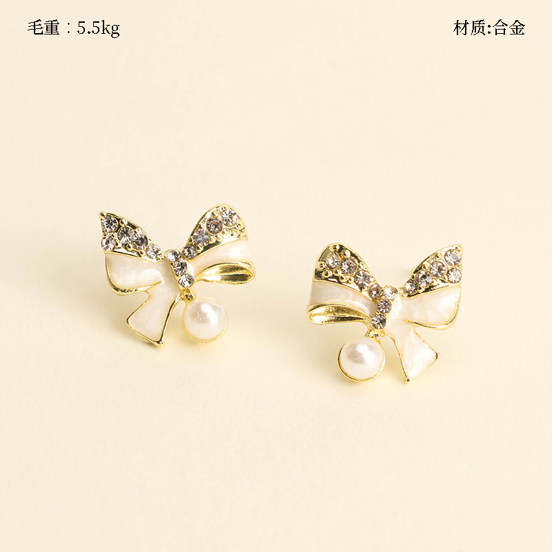 Rhinestone bow tie hanging pearl earrings