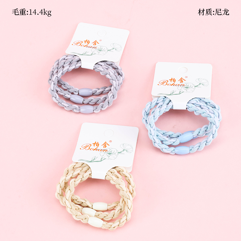 Boxed three colorful twist rubber bands