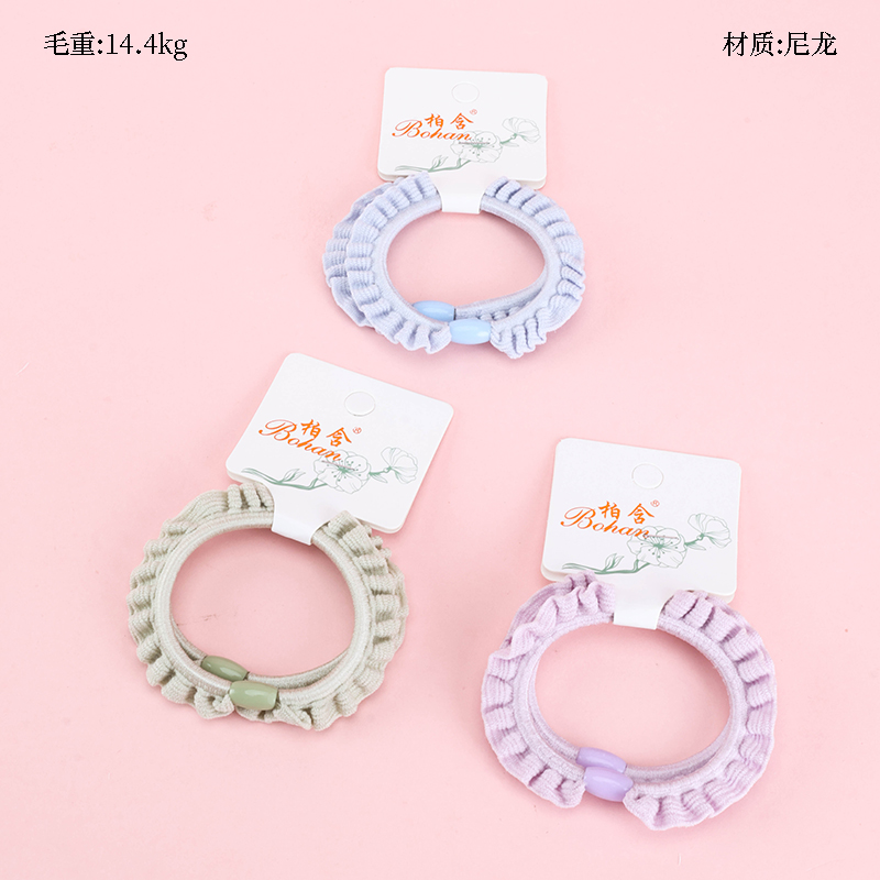 Boxed two light-colored wood-ear rubber bands