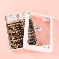 Boxed Five Mini Gold Nylon Hair Ties 4012202217