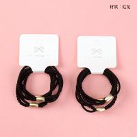 Boxed Two-in-One Black Nylon Rubber Band Hair Tie 4012700470