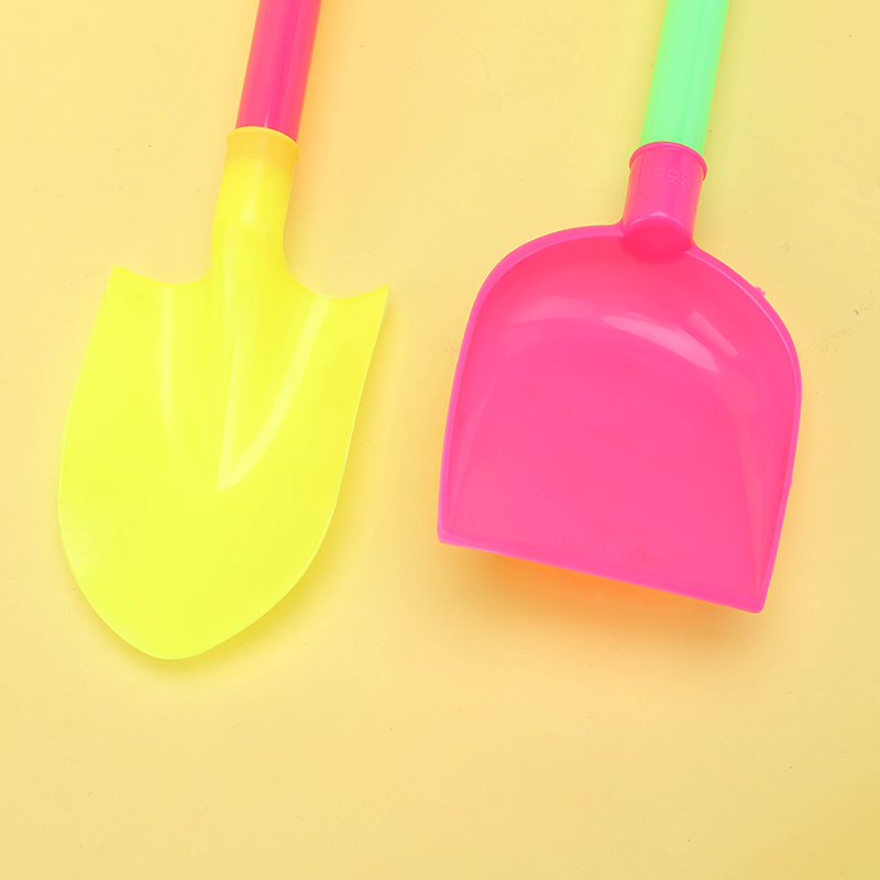 Two Colorful Beach Shovels