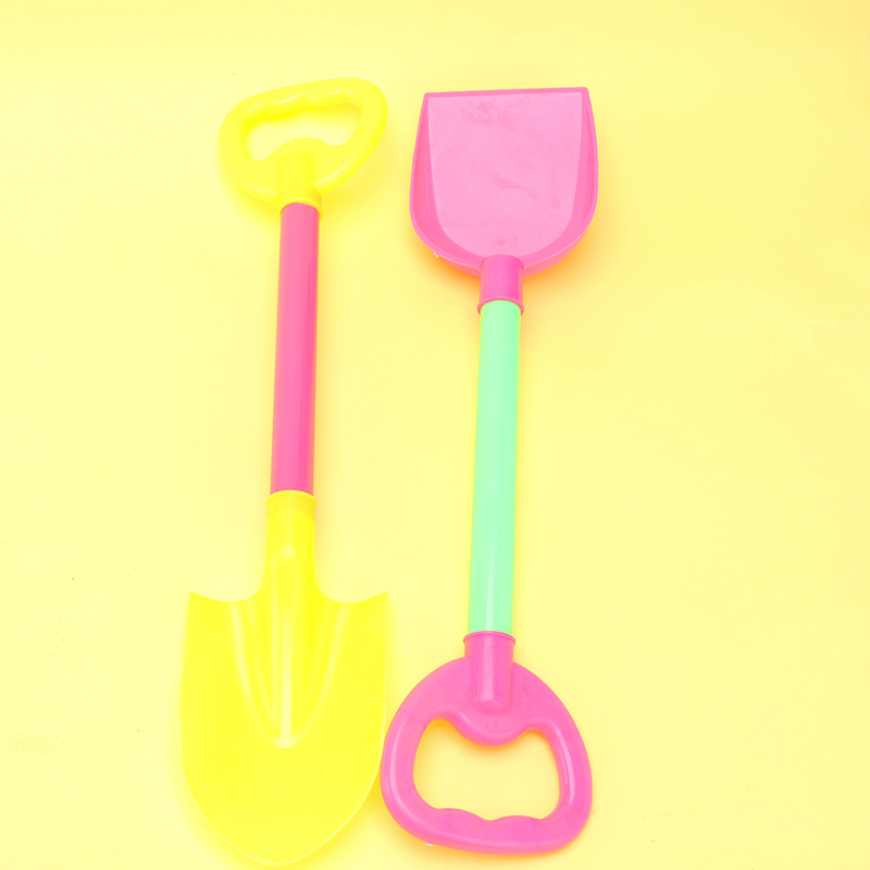 Two Colorful Beach Shovels