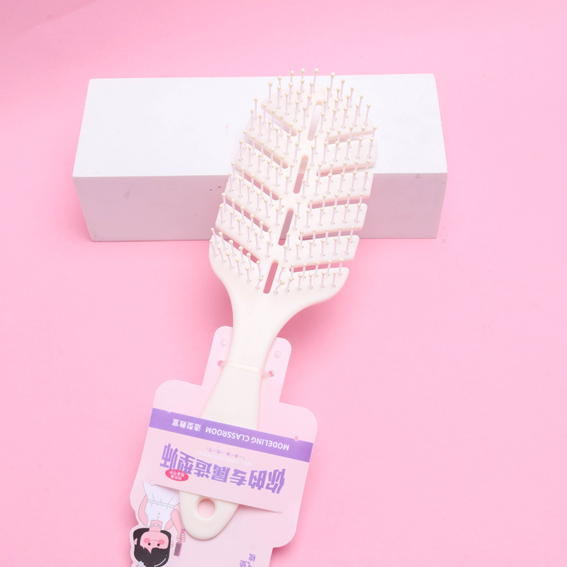 1006 Large Curved Leaf Volumizing Comb PP TPR