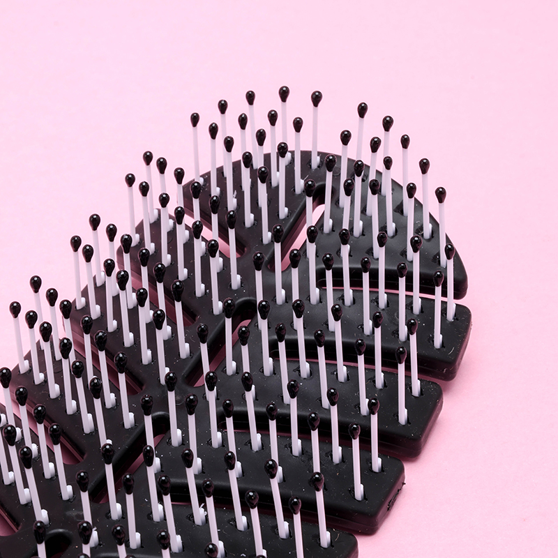 1006 Large Curved Leaf Volumizing Comb PP TPR