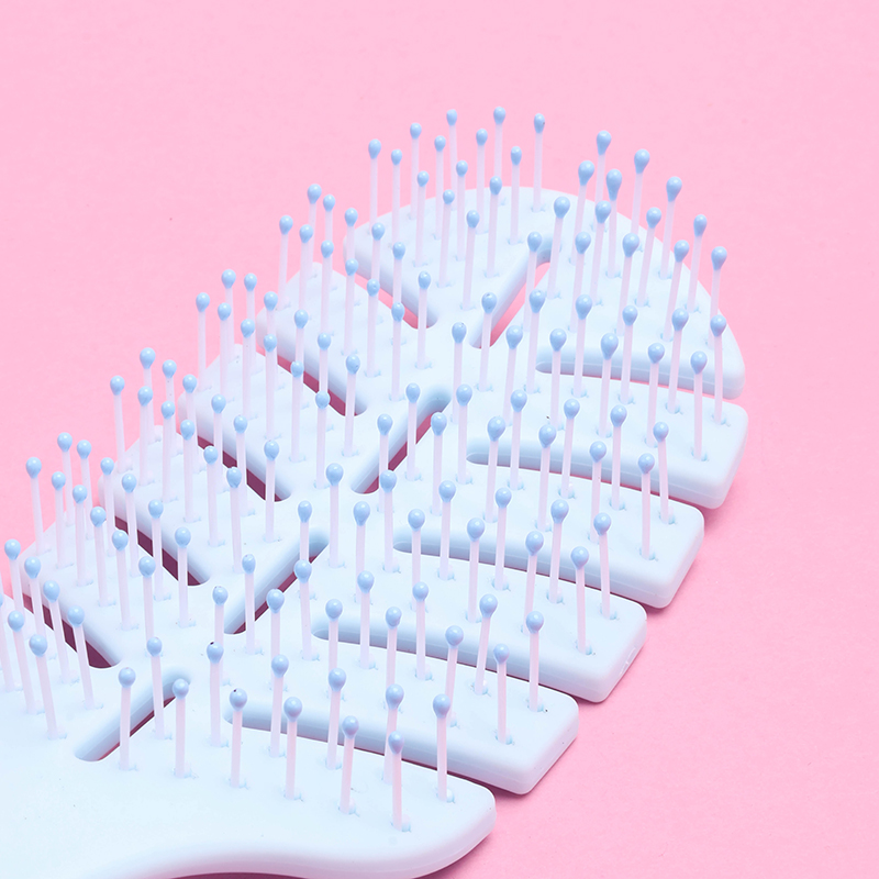 1009 Large Curved Leaf Volumizing Comb PP TPR