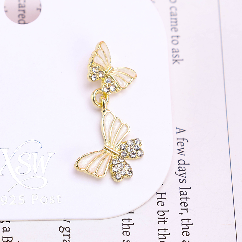 Two Diamond Butterfly Ear Stud