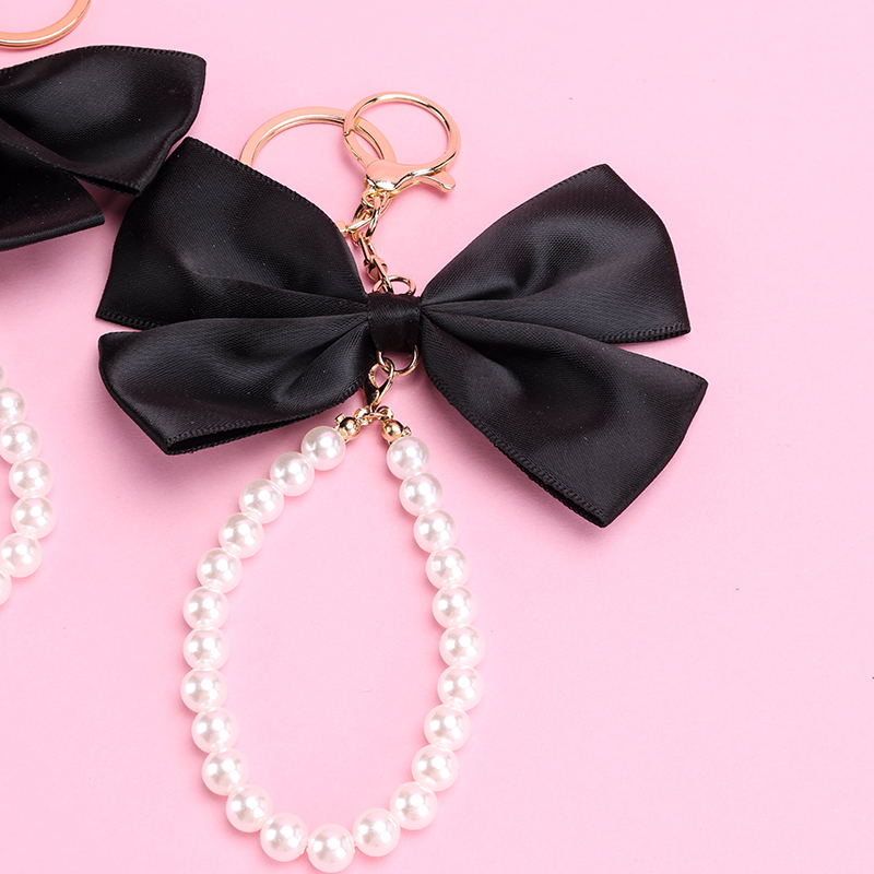 Bow Pearl Charm