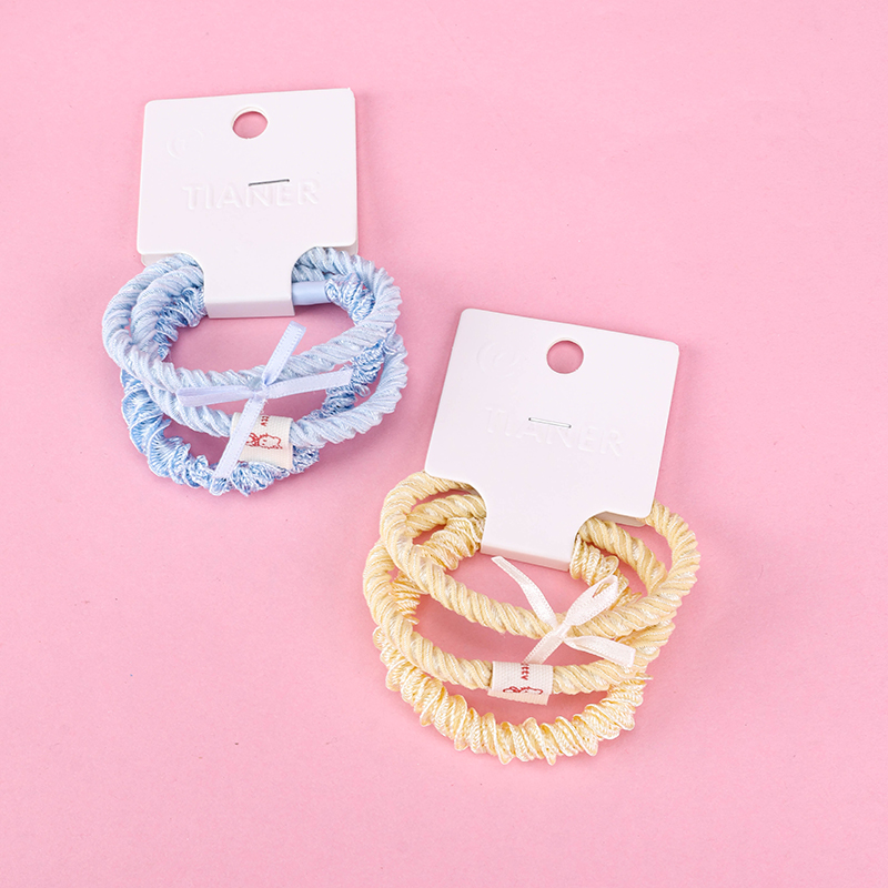 Three Bow Labeled Rubber Hair Bands