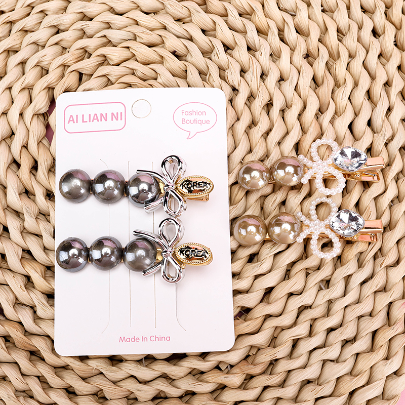 Boxed Fashion Pearl Bow Tie Duckbill Hair Clip Alloy Code 4010402965