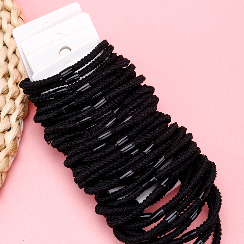 Four Black Hair Ties