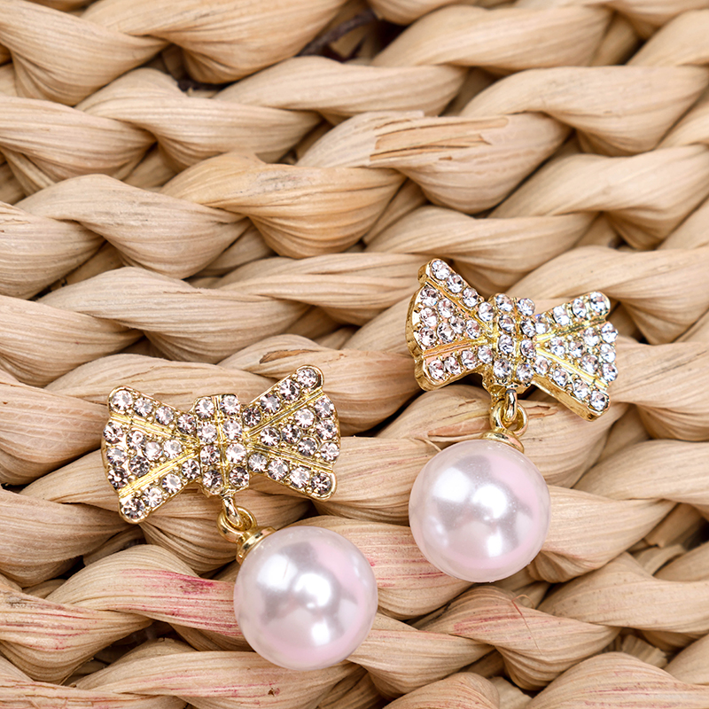 Diamond Bow Tie Pearl Ear Studs