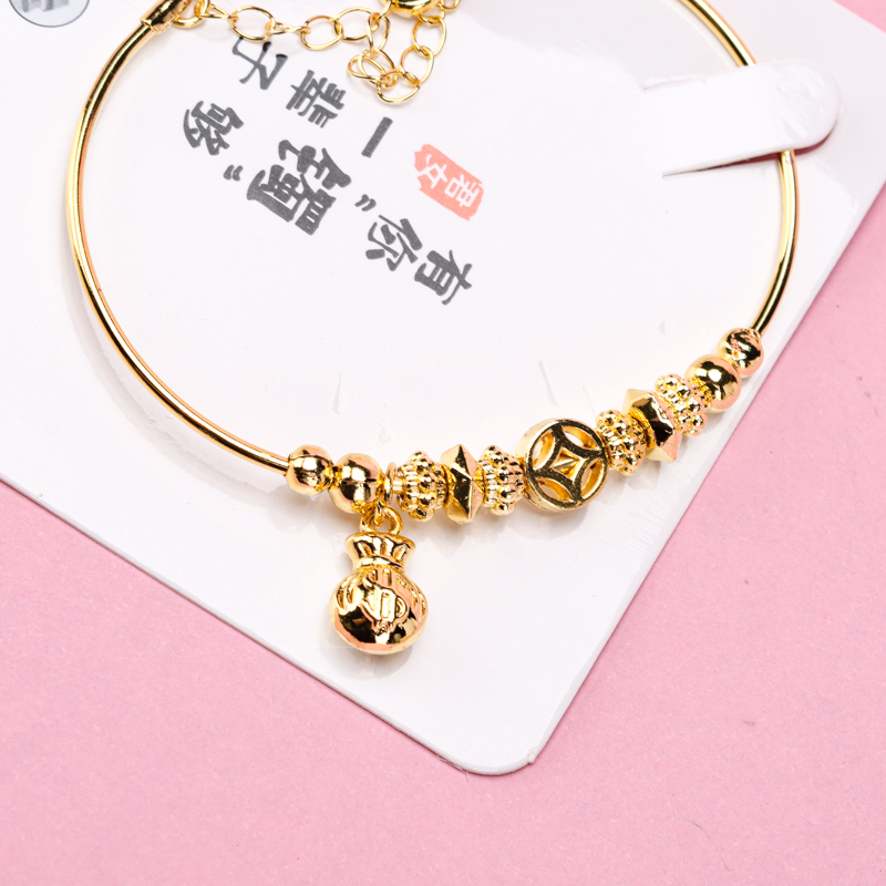 Gold Color Coiled Pendant Bracelet