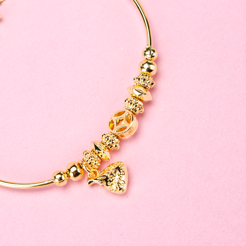 Gold Color Coiled Pendant Bracelet