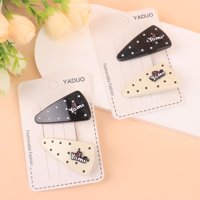 YD黑白波点三角压夹 2