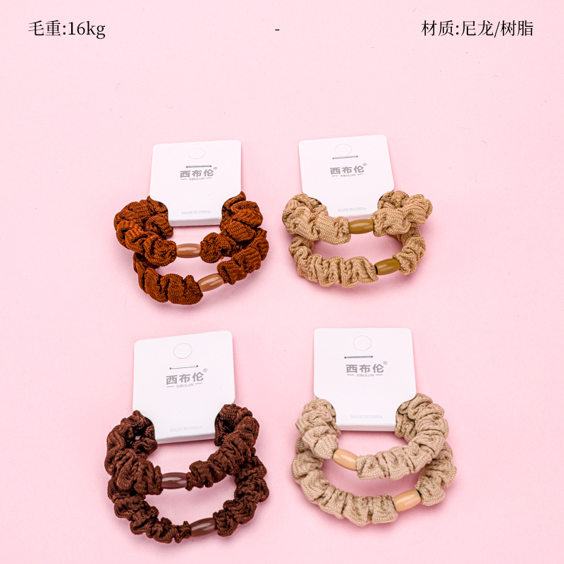 Hai dải cao su đính cườm đan màu nâu