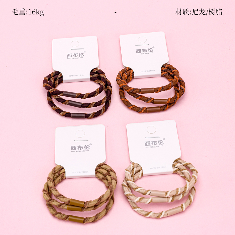 Ba sắc thái của mocha, màu sắc tương phản, quấn quanh một dải cao su.